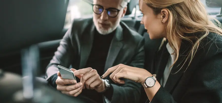 Passengers in a chauffeur-driven car