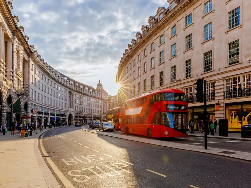 London street with a red double-decker bus